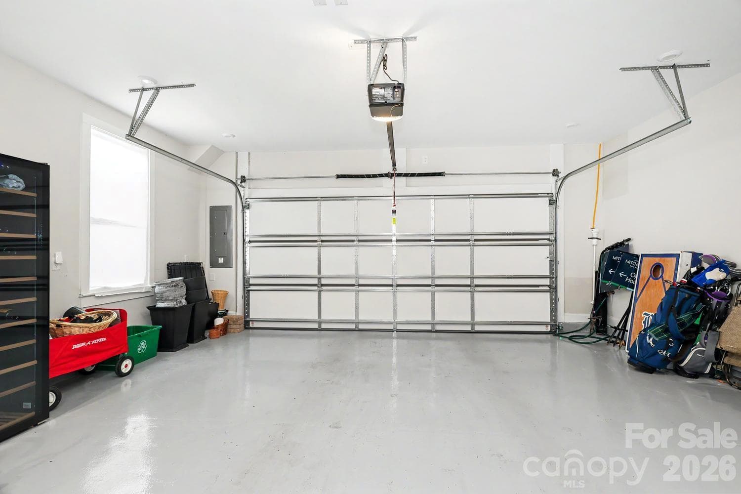 Professional epoxy flooring in the spacious garage. - 2505 Kenmore Avenue, Charlotte