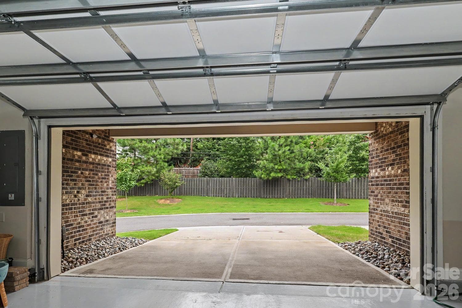 This property features an expanded parking pad/driveway with additional space for two extra vehicles. - 2505 Kenmore Avenue, Charlotte