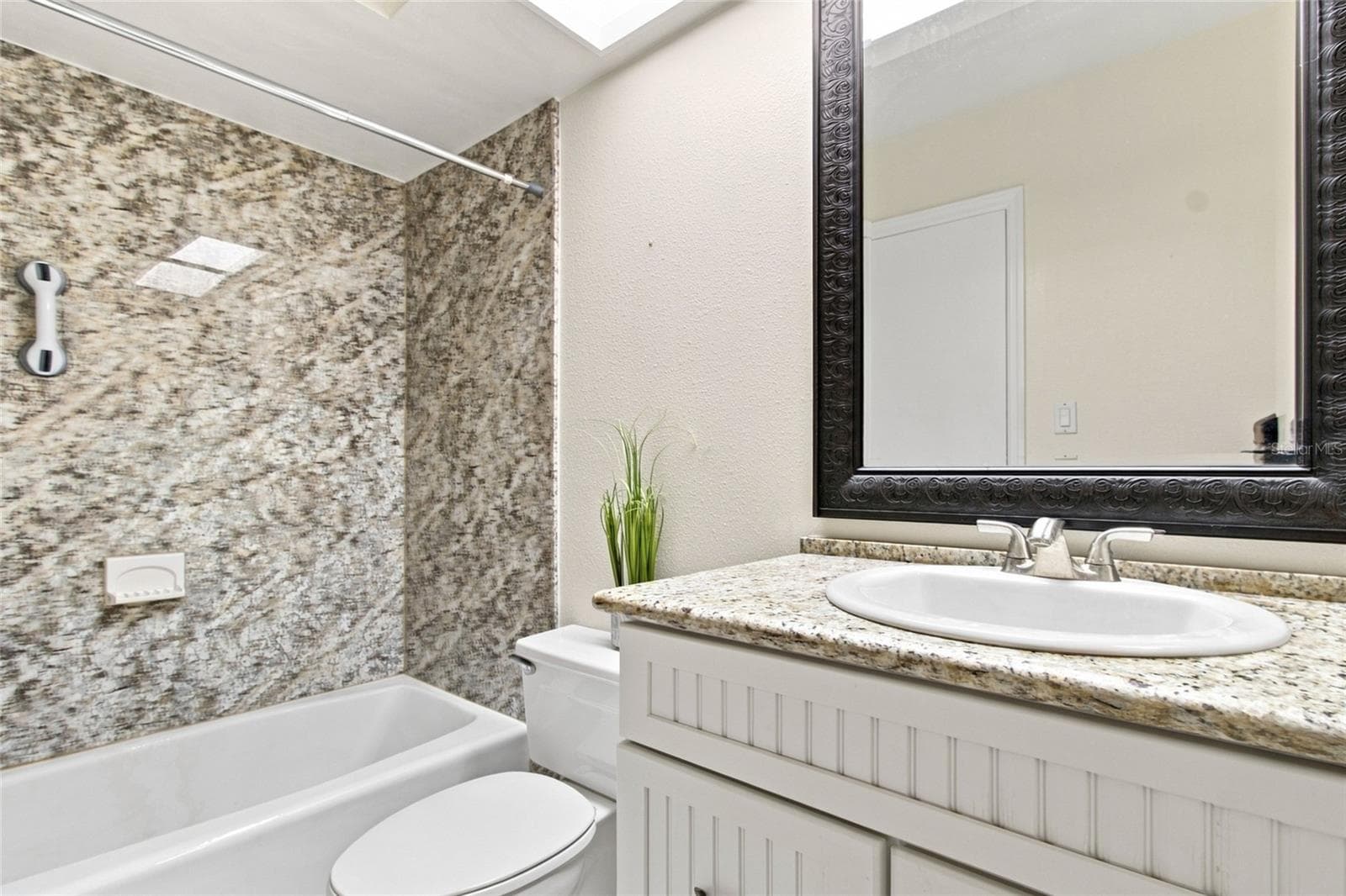 2nd bdroom's ensuite bath - 2599 DOLLY BAY DR #306, PALM HARBOR