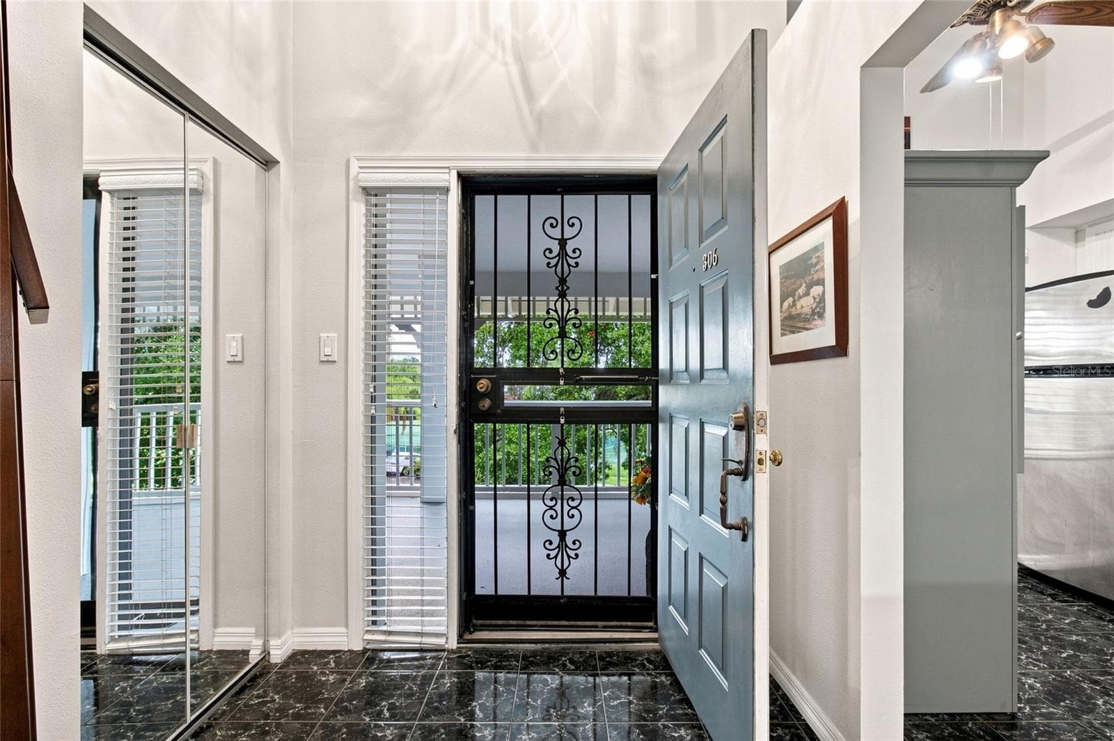 Front Door/Foyer with Closet - 2599 DOLLY BAY DR #306, PALM HARBOR