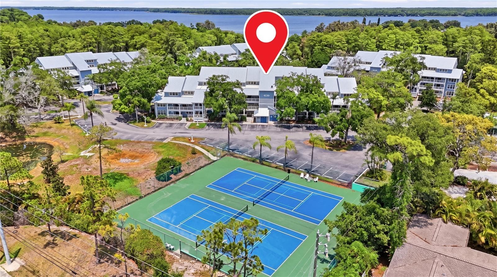 Tara Building relating to Tennis Courts. - 2599 DOLLY BAY DR #306, PALM HARBOR