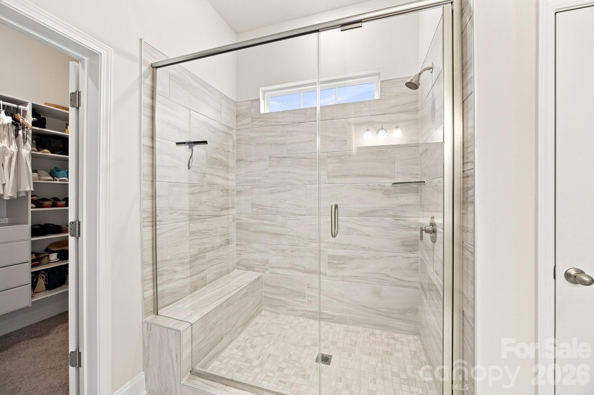 Primary bathroom shower with seating - 8125 Warford Little Road, Denver