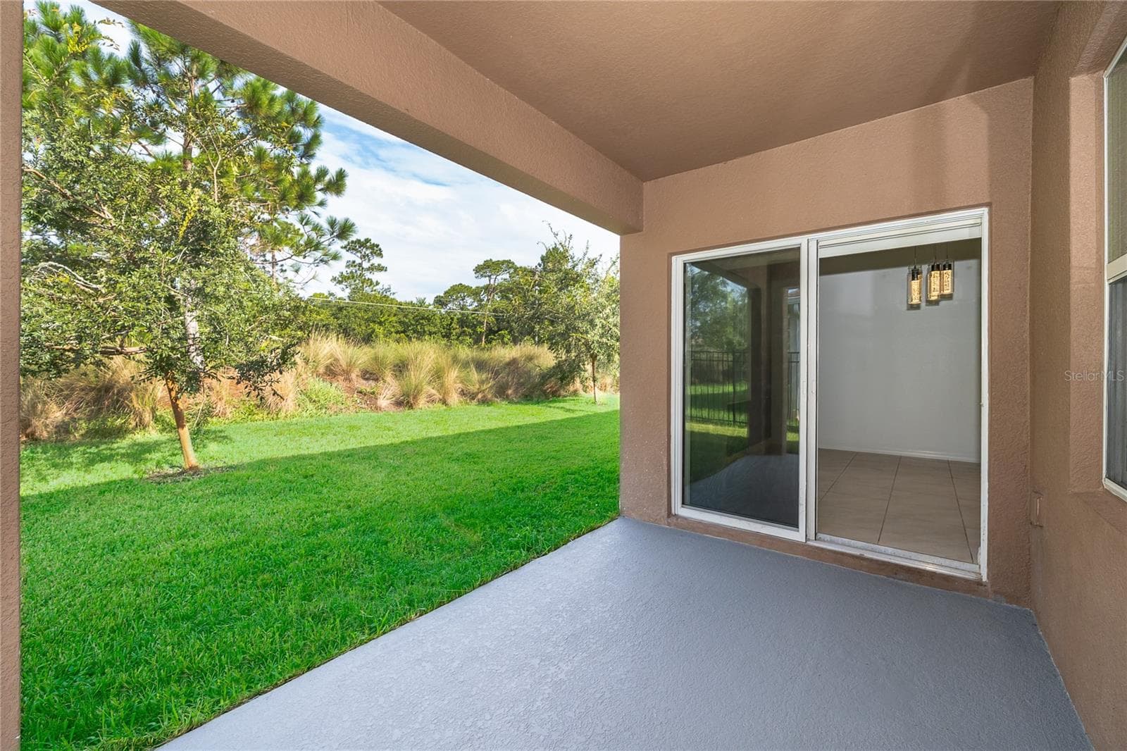 Rear Patio - 239 LAZIO CIR, DEBARY