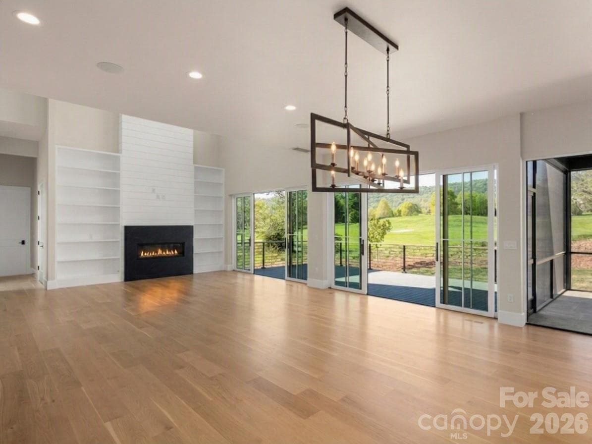 Virtually edited to include completed fireplace. - Arden