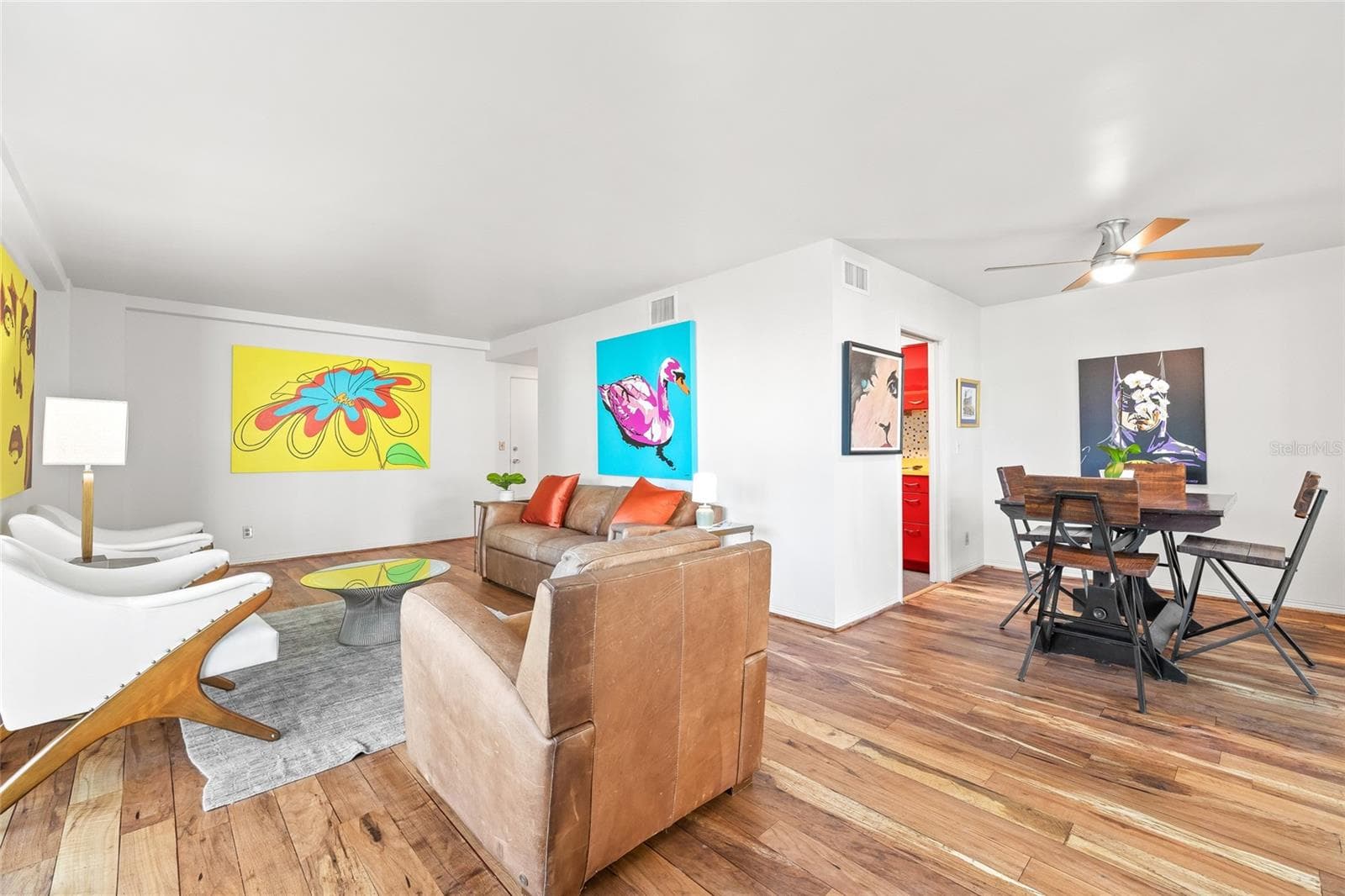 This spacious living/dining combo is great for entertaining. There is enough room for an office desk, a reading nook, or a workout area. - 1012 N SHORE DR NE #14, ST PETERSBURG