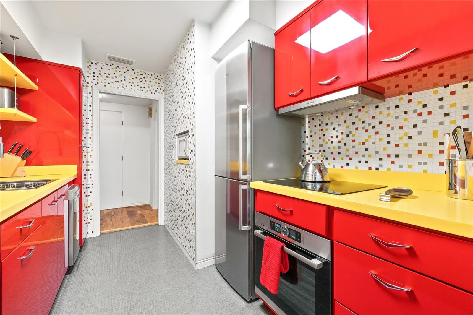 The kitchen update included reorienting the layout for better functionality. - 1012 N SHORE DR NE #14, ST PETERSBURG