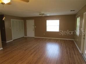 Entry to Living Room with laundry closet on left - 1122 VIRGINIA CT, EUSTIS