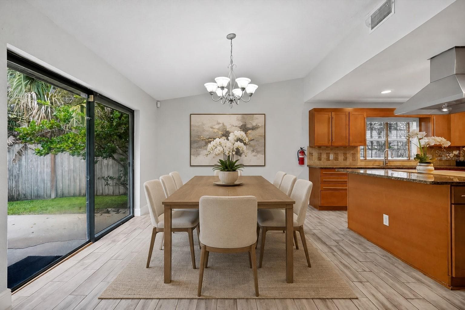 Dining room virtually staged - 8405 WAIALAE CT, ORLANDO