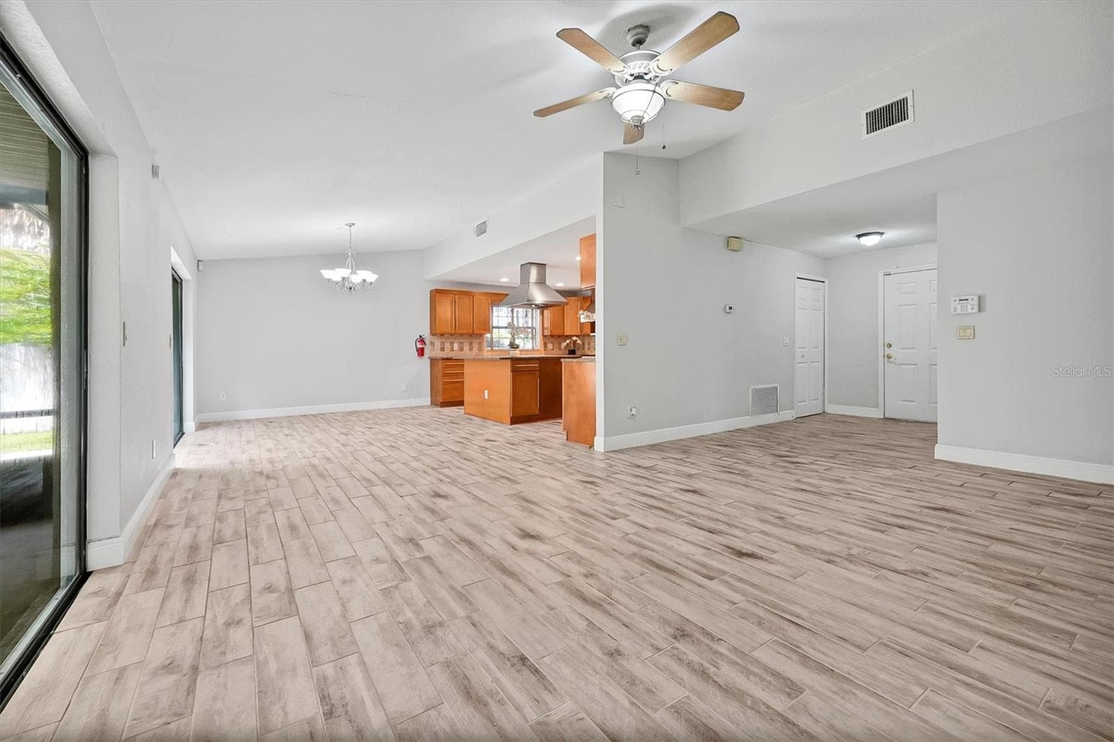 Dining room & kitchen & living room space - 8405 WAIALAE CT, ORLANDO