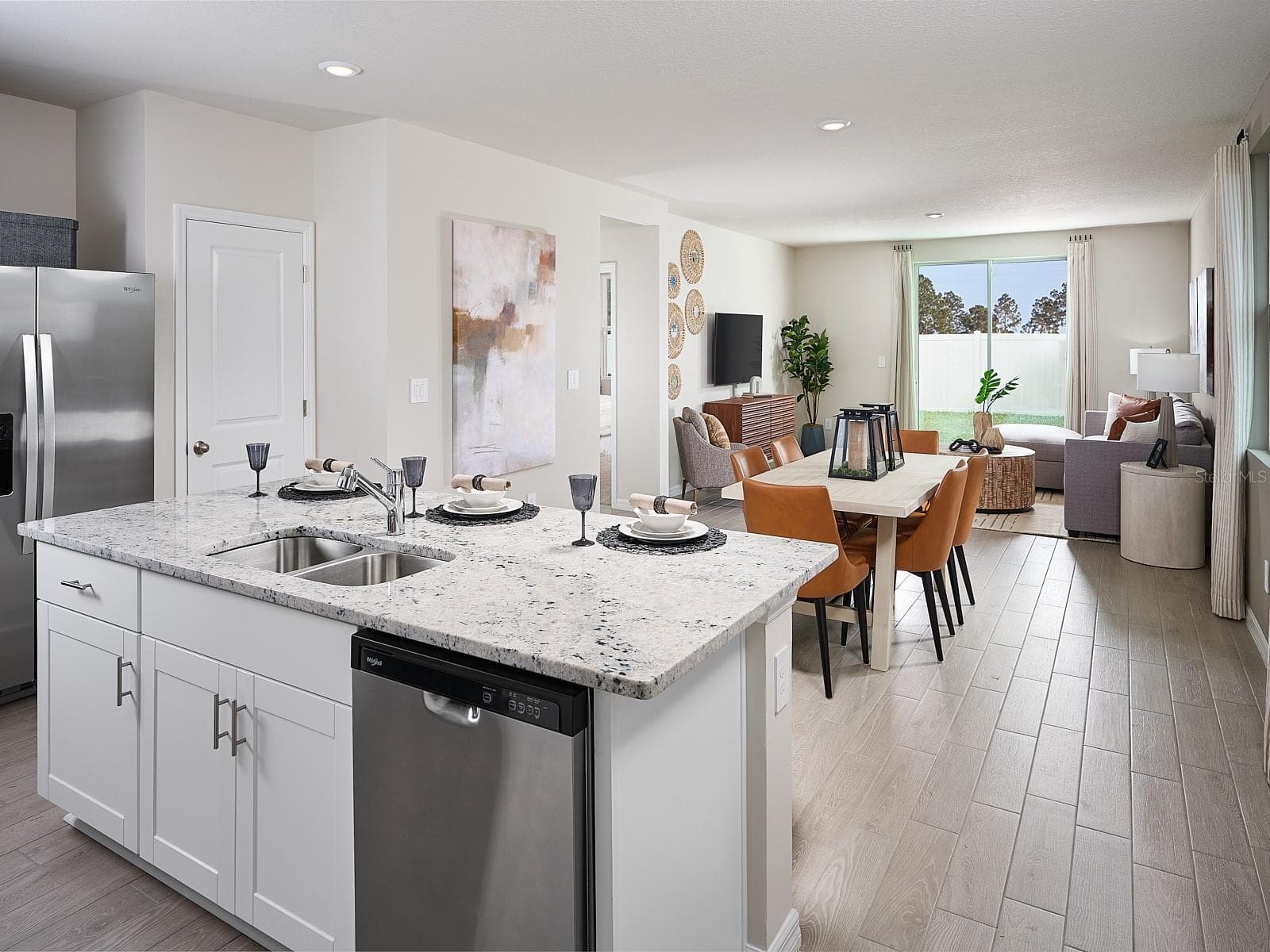 Photo is not of the actual home, but is an inspirational photo of builder’s model home and may depict options, furnishings, and/or decorator features that are not included. - 1533 BREKEY WAY, ZEPHYRHILLS