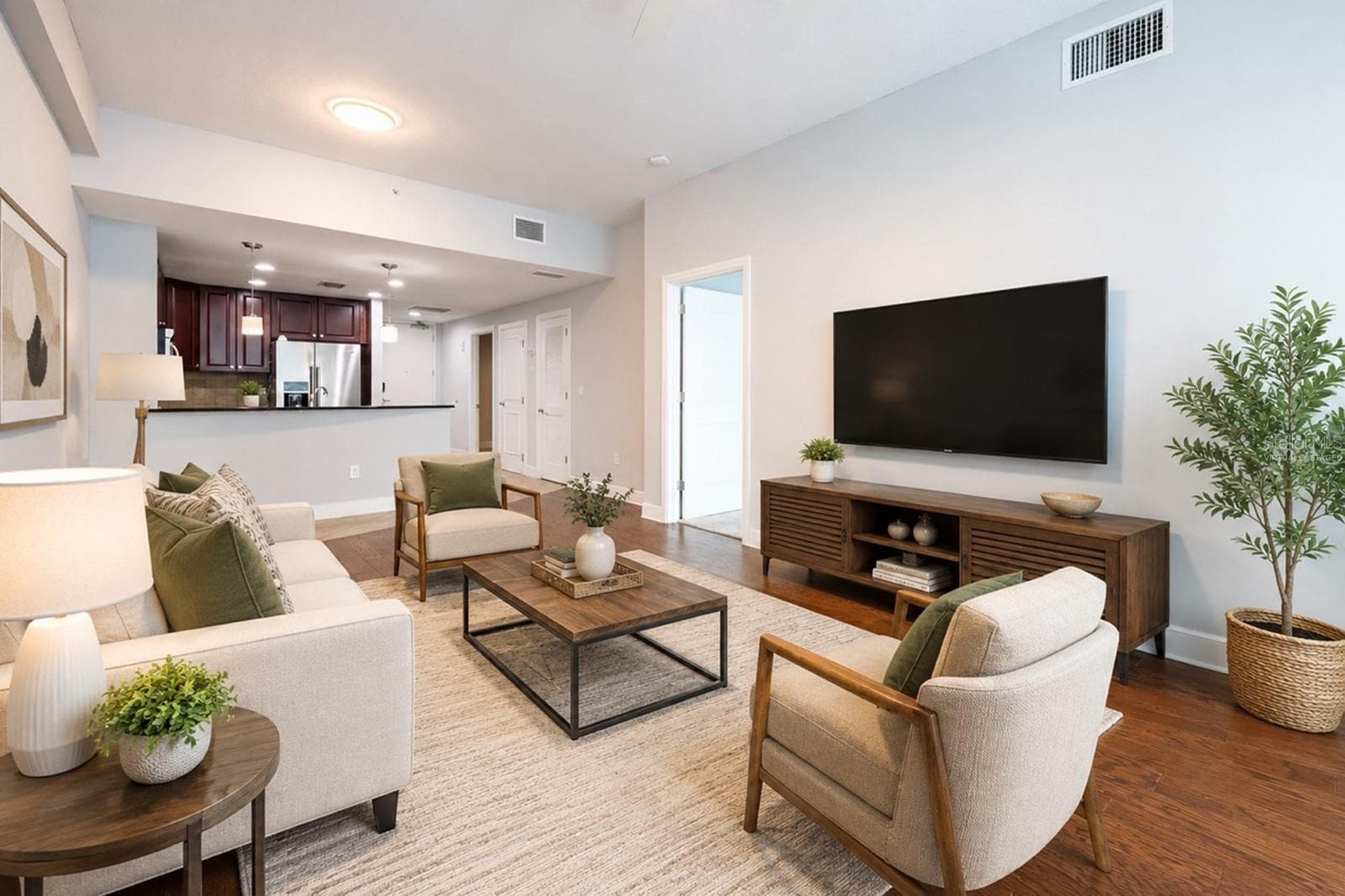 Virtually Staged Image. Living Room. - 101 S EOLA DR #614, ORLANDO