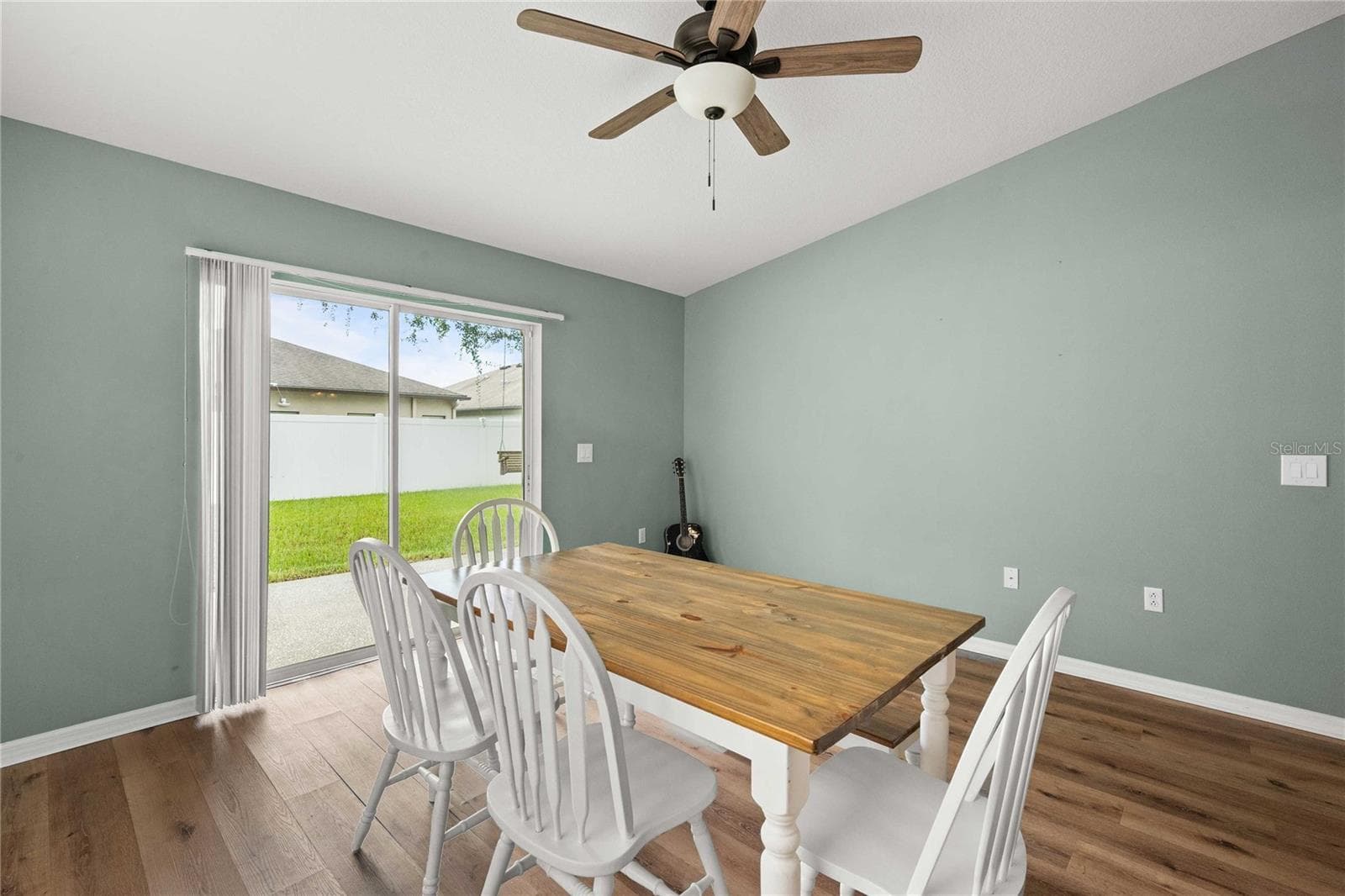 Dining area with view to backyard. - 14423 FINSBURY DR, SPRING HILL