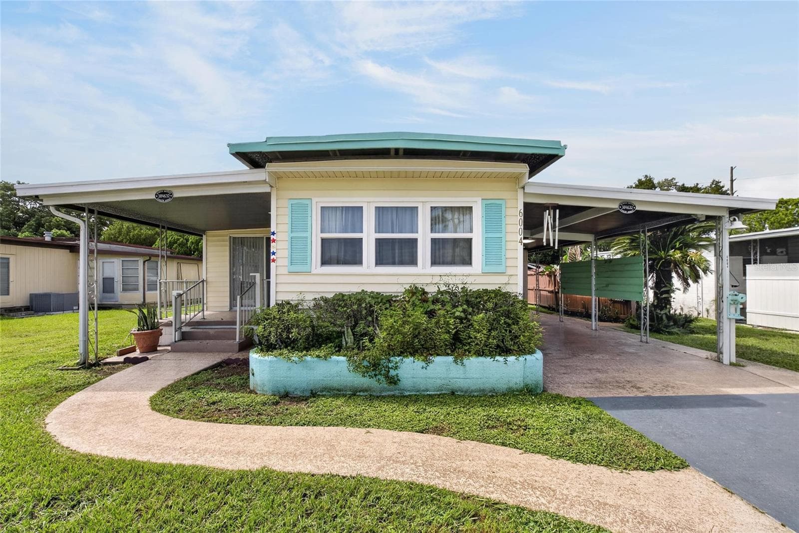 Mobile Home at 6004 ALPINE DR, ZEPHYRHILLS, photo 2 of 46