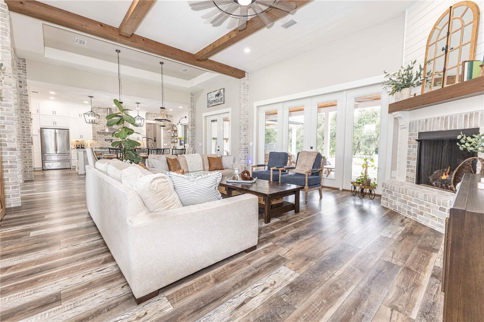Living room with fireplace - 8818 SW 73RD PATH, BUSHNELL