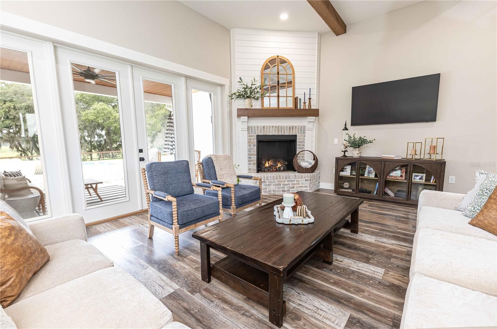 Living room opens to back patio - 8818 SW 73RD PATH, BUSHNELL