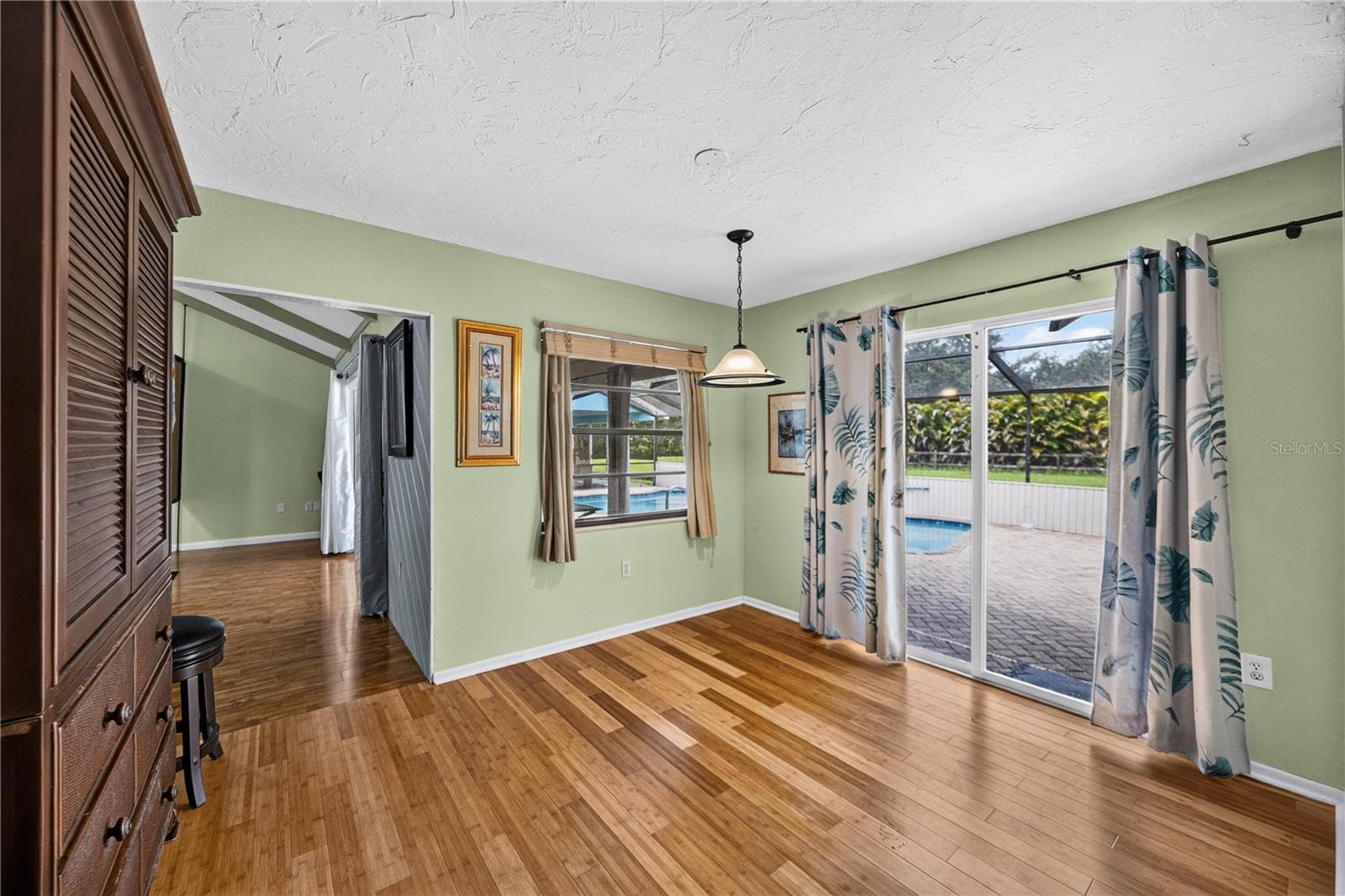 Breakfast area with pool views. - 1305 GREENFIELD CIR, VENICE