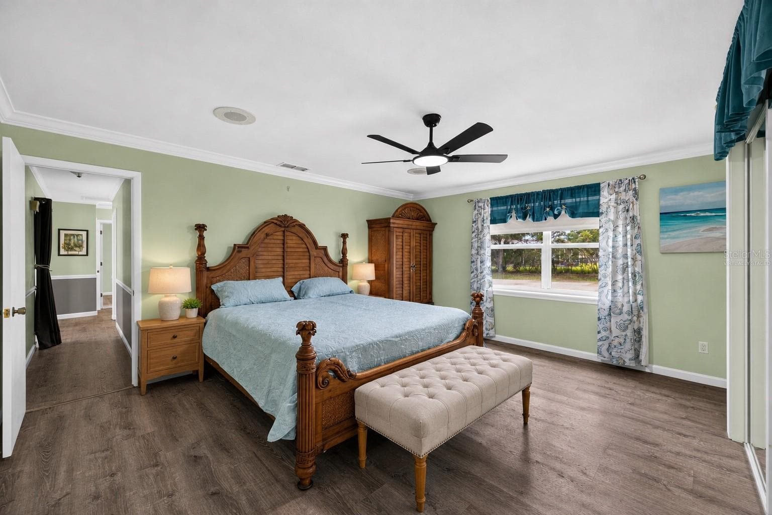 Virtually staged - Primary bedroom with coordinated furnishings. - 1305 GREENFIELD CIR, VENICE