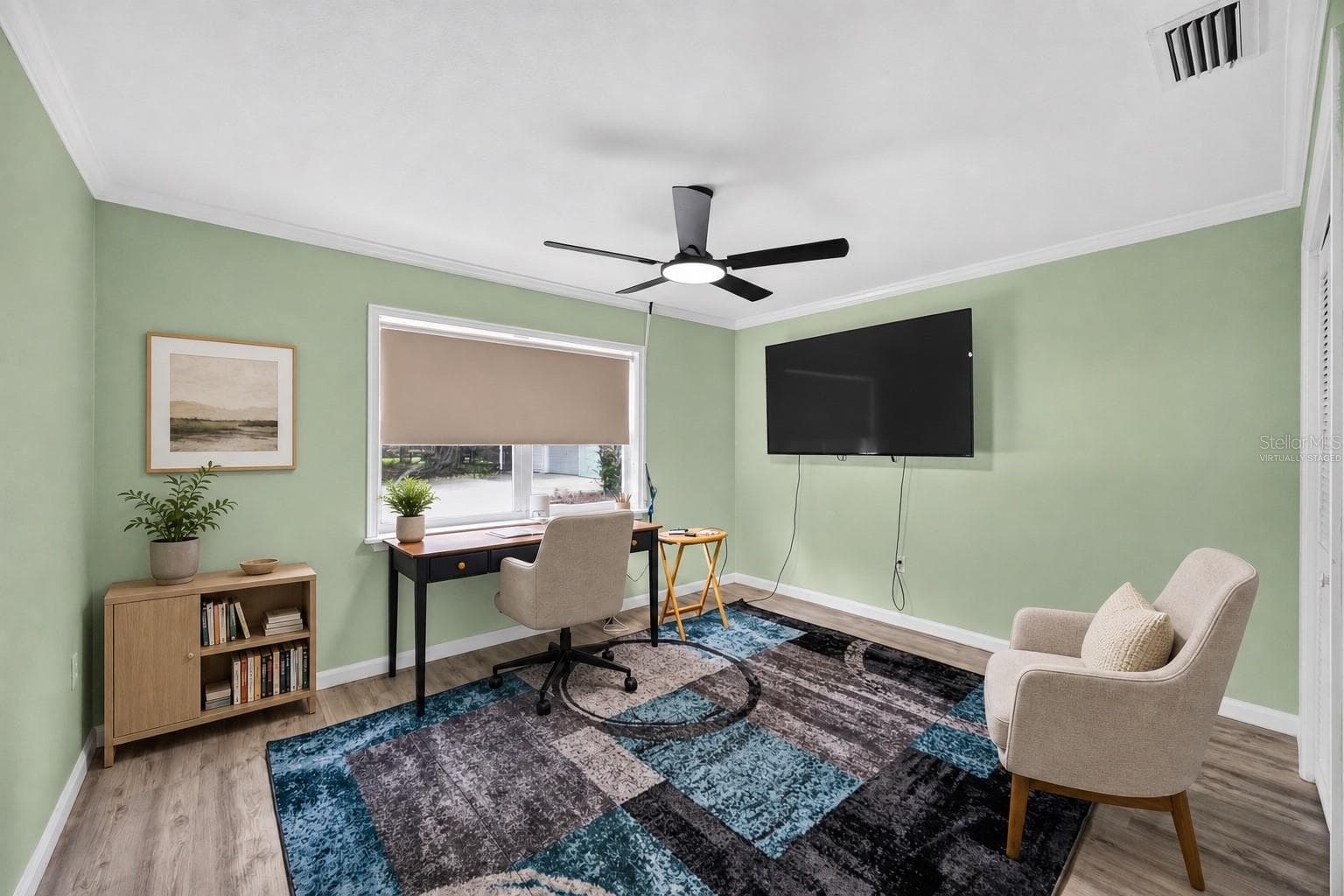 Virtually staged - Home office with desk, storage and guest chair. - 1305 GREENFIELD CIR, VENICE