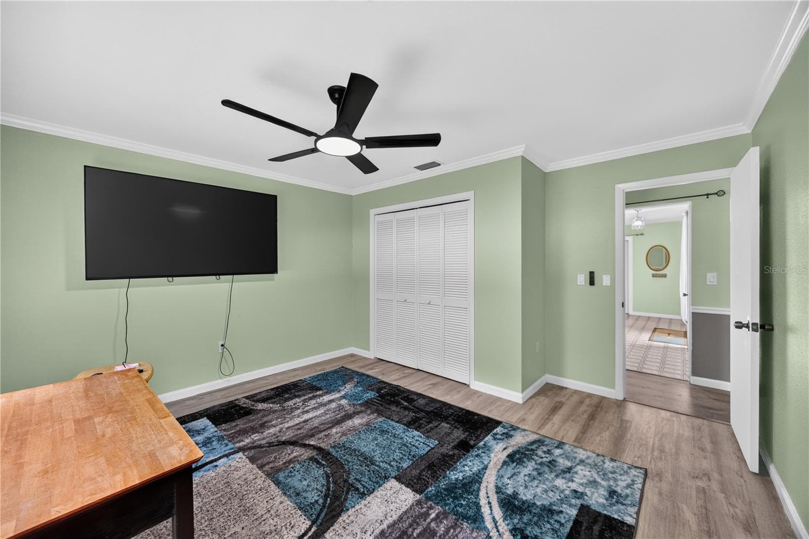Home office or den with TV and flexible layout. - 1305 GREENFIELD CIR, VENICE