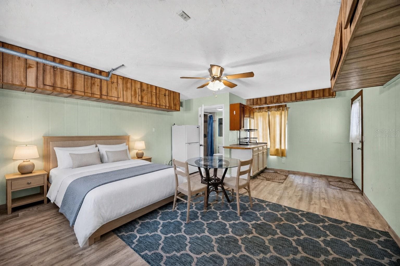 Virtually staged - Downstairs studio sleeping quarters and dining area. - 1305 GREENFIELD CIR, VENICE