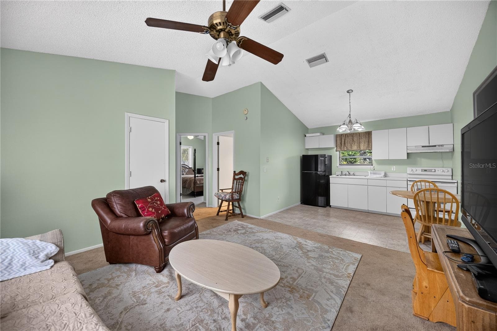 Upstairs living room and adjoining bedrooms. - 1305 GREENFIELD CIR, VENICE
