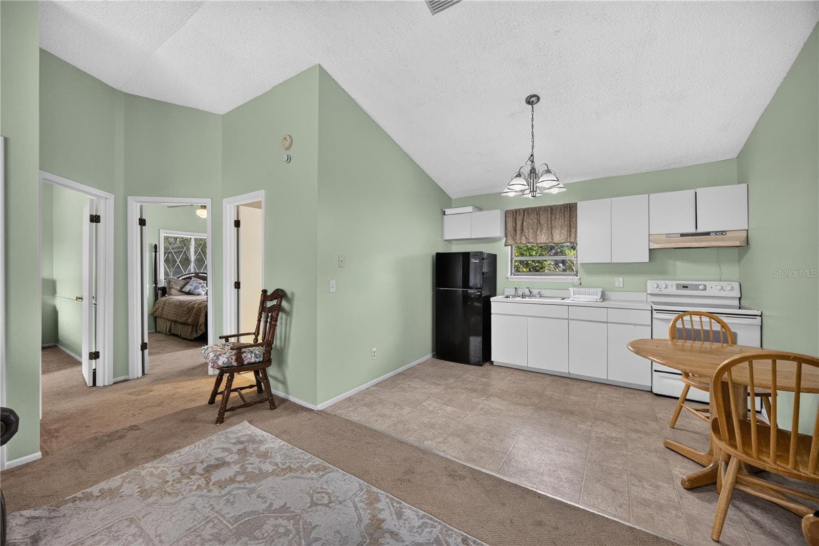 Upstairs 2/1 living area with kitchenette. - 1305 GREENFIELD CIR, VENICE