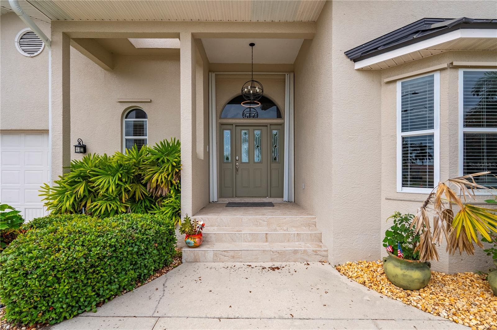Covered Entry - 265 BELVEDERE CT, PUNTA GORDA