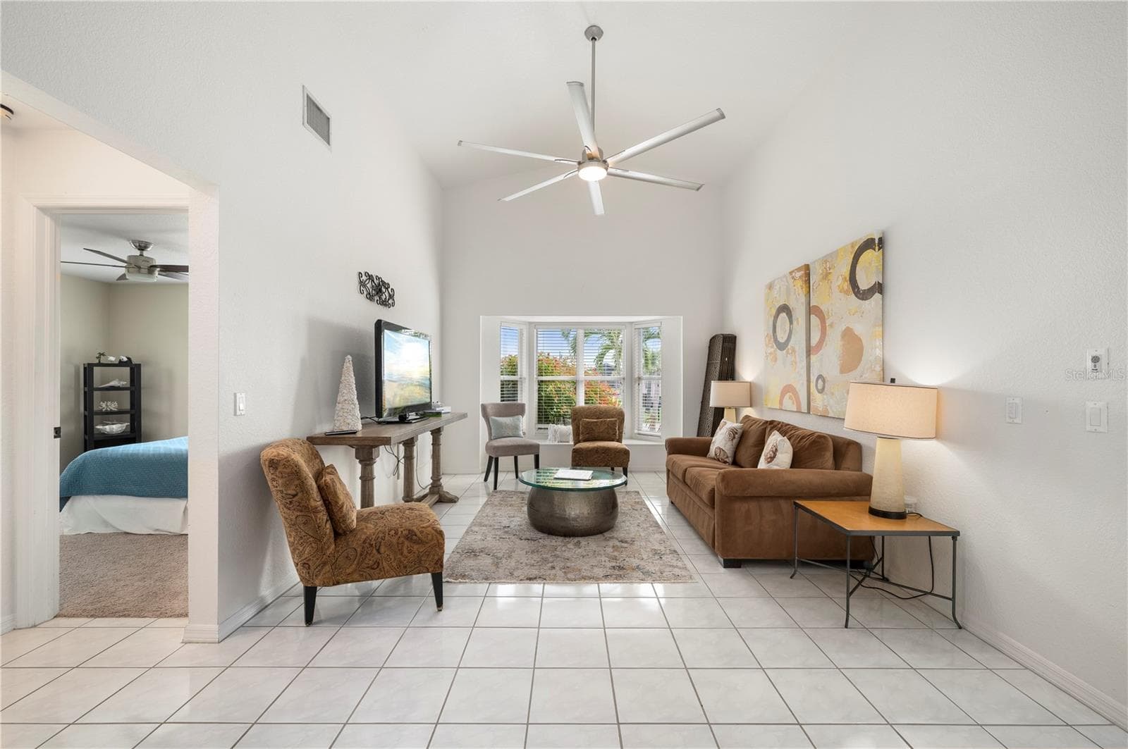 This ralaxing area could be a formal dining room - 265 BELVEDERE CT, PUNTA GORDA