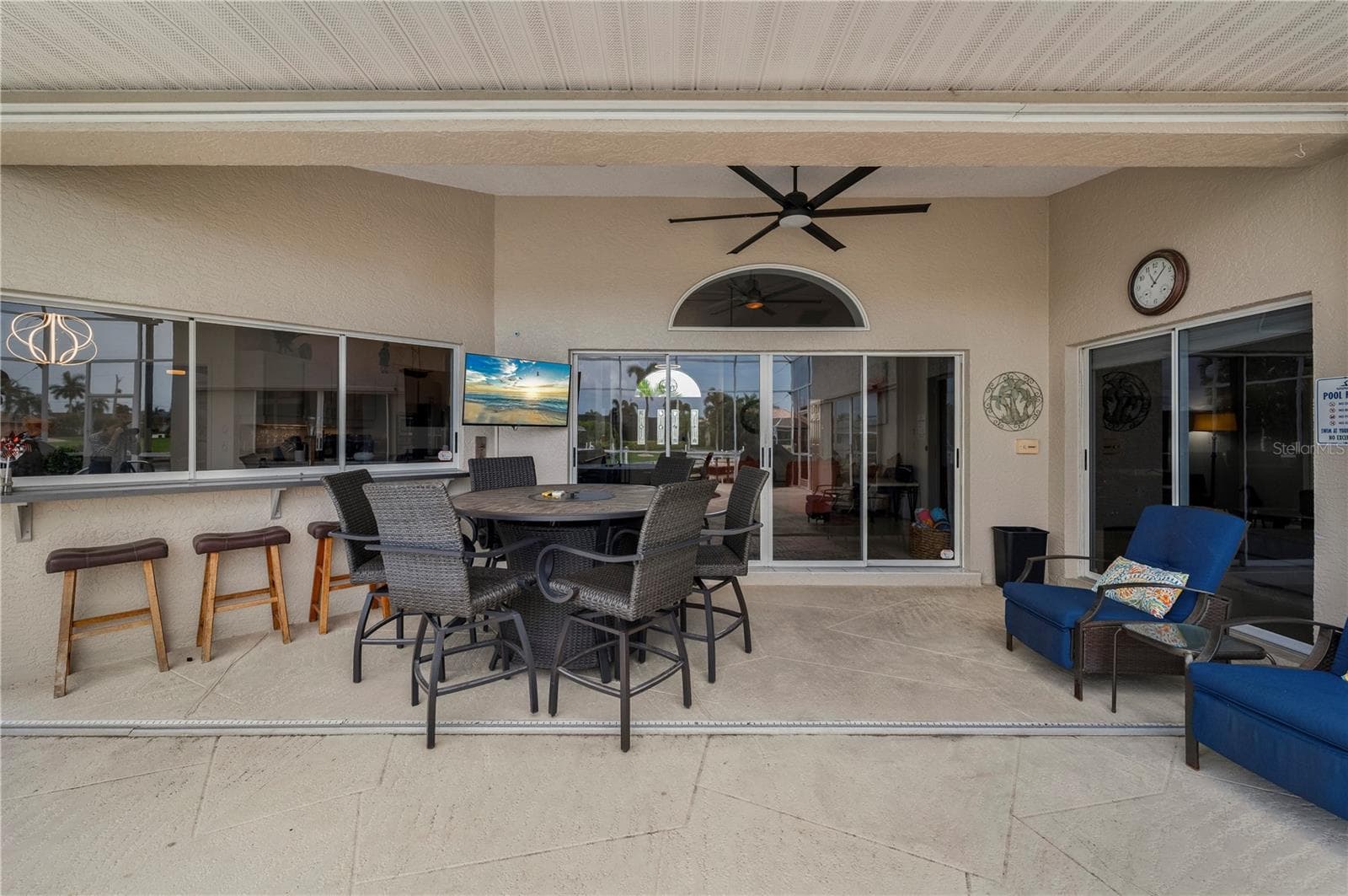 Relaxing covered waterfront lanai - 265 BELVEDERE CT, PUNTA GORDA