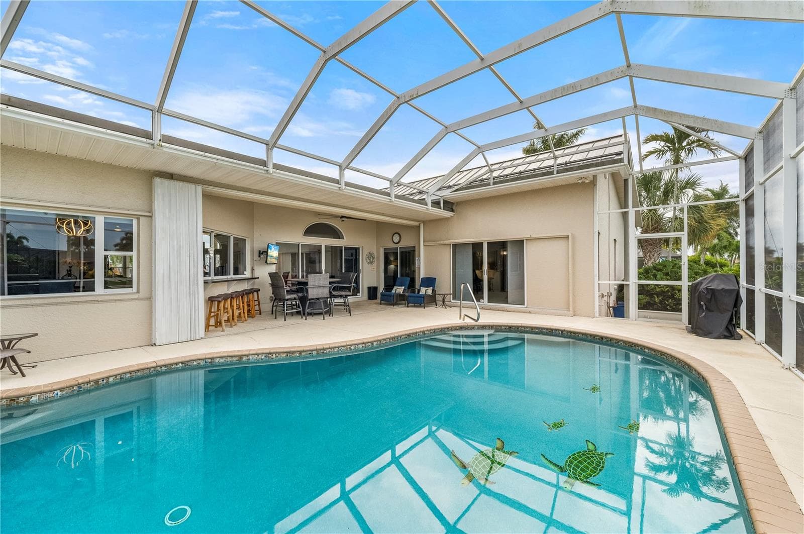 Screened pool enclosure - 265 BELVEDERE CT, PUNTA GORDA
