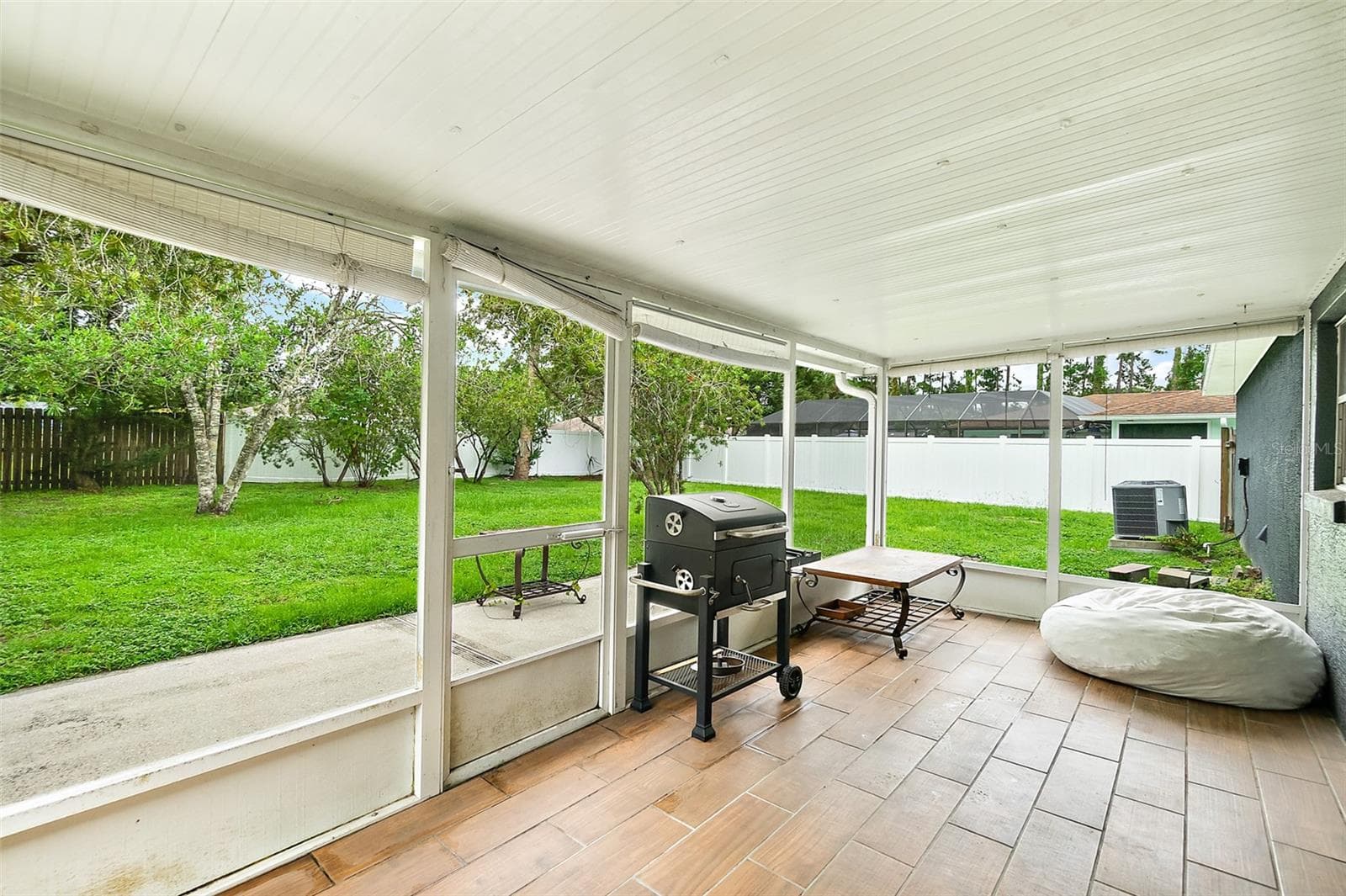 Covered & Screened Rear Patio - 17 PINELARK LN, PALM COAST