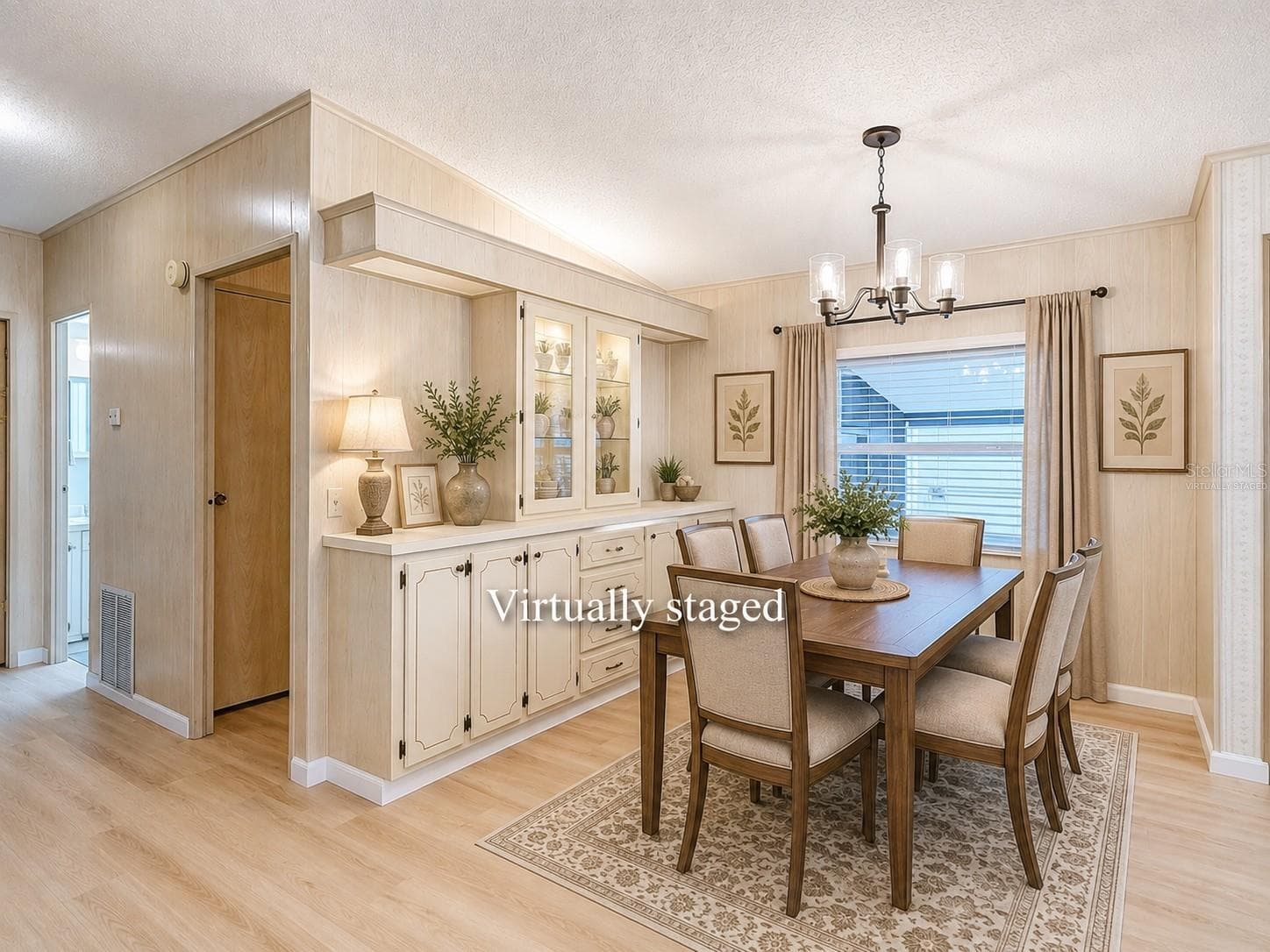 Virtually Staged Dining Room - 4919 BLANCO DR, ZEPHYRHILLS