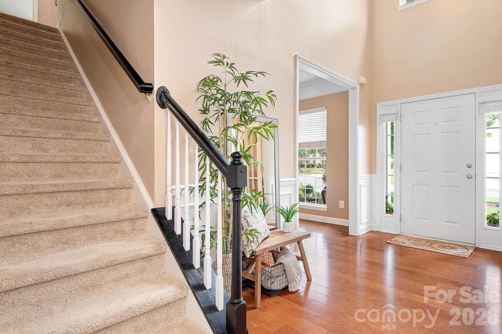 Welcoming two story foyer with wood floors - Fort Mill