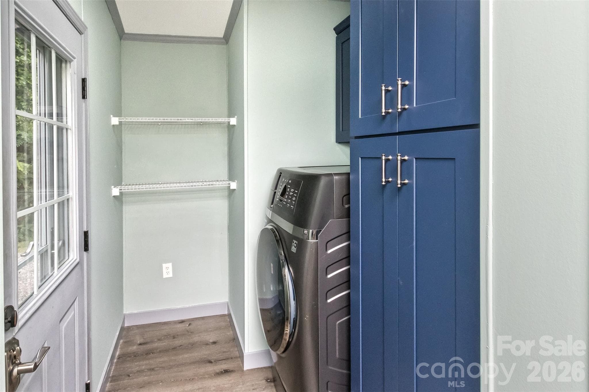 Mud room with all-in-one washer/dryer - 25 Asa Court, Black Mountain