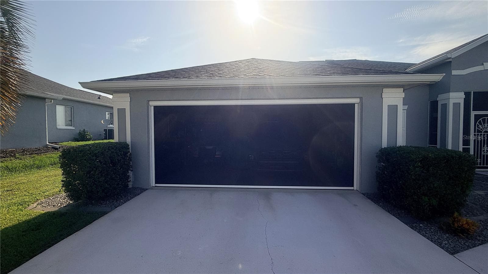 Garage has automatic door screen... - 2293 NW 58TH TER, OCALA