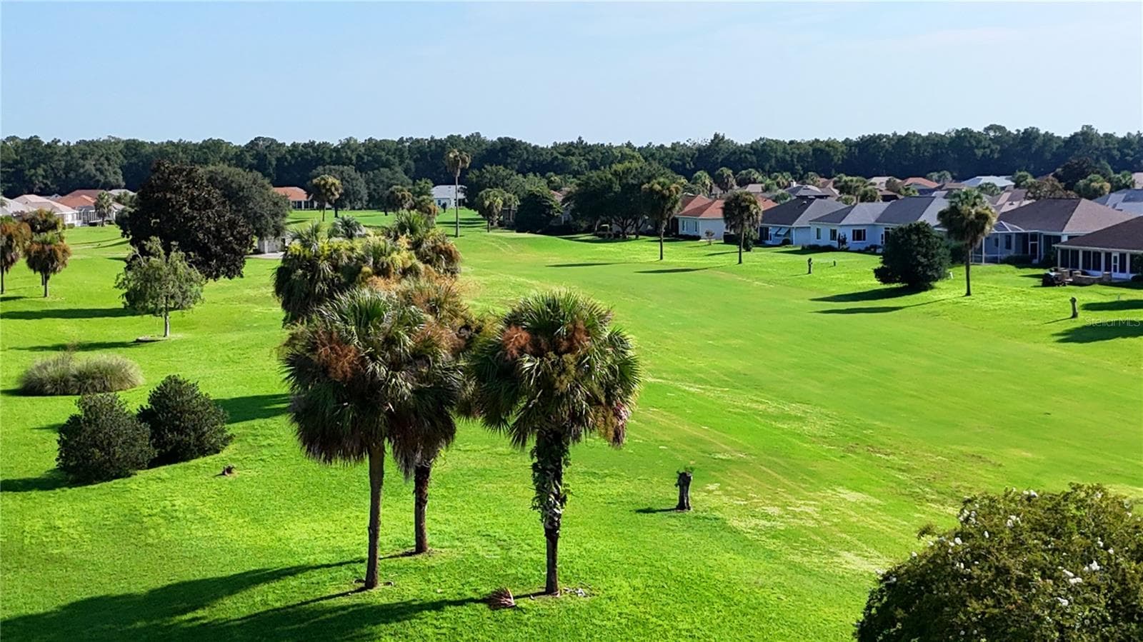 and home overlooks golf course... - 2293 NW 58TH TER, OCALA