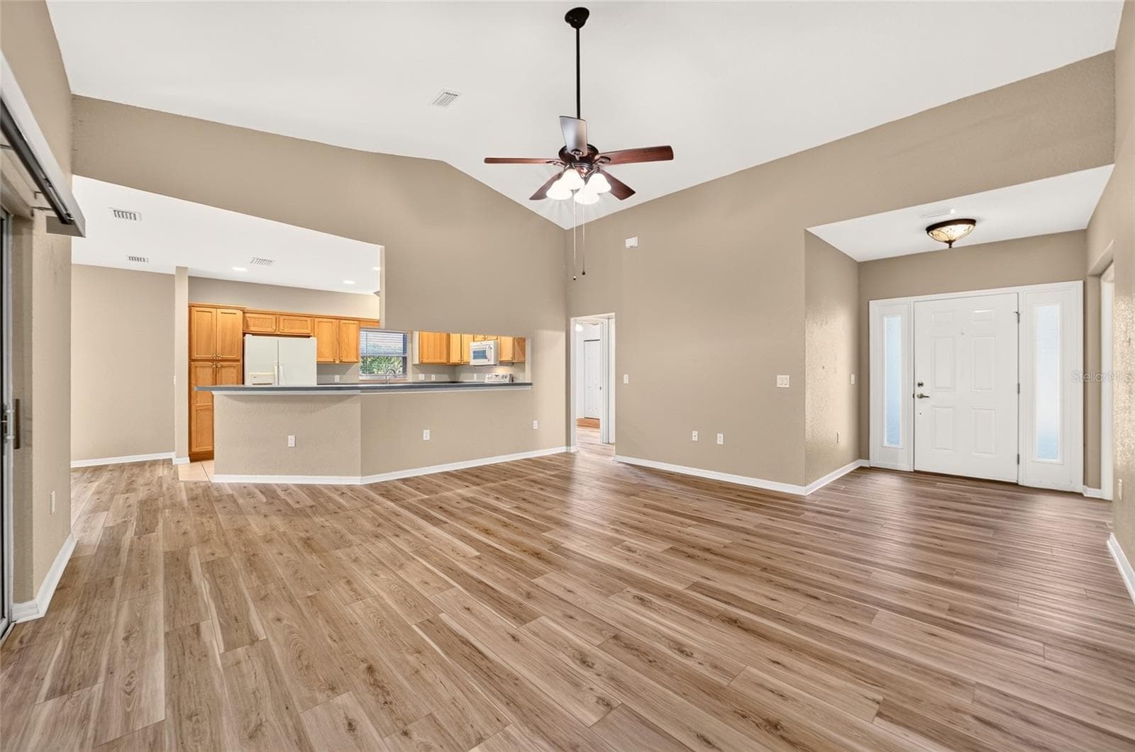 Living room from primary bedroom - 19369 SW 100TH LOOP, DUNNELLON