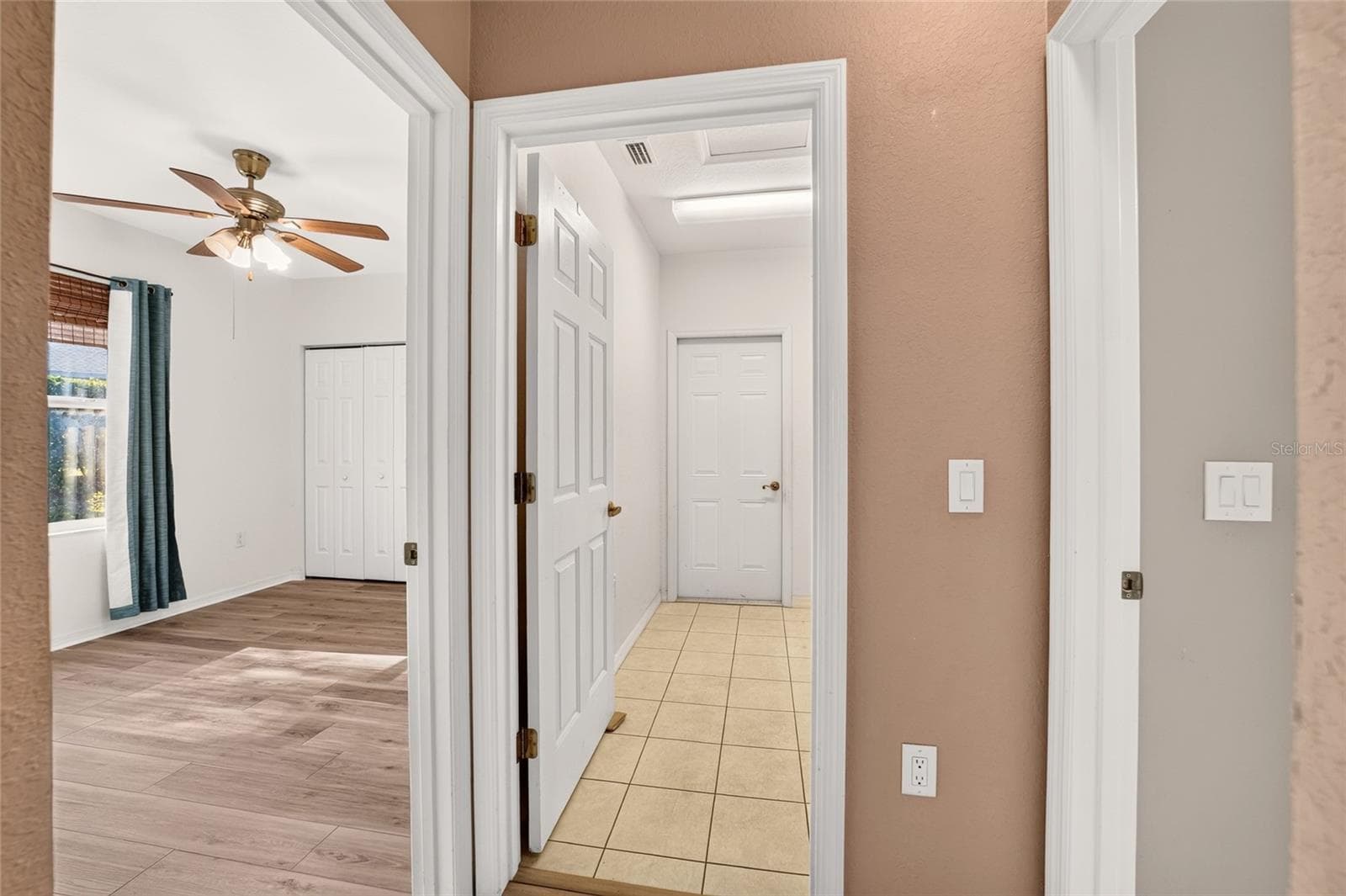 Laundry room and 3rd bedroom across the house - 19369 SW 100TH LOOP, DUNNELLON