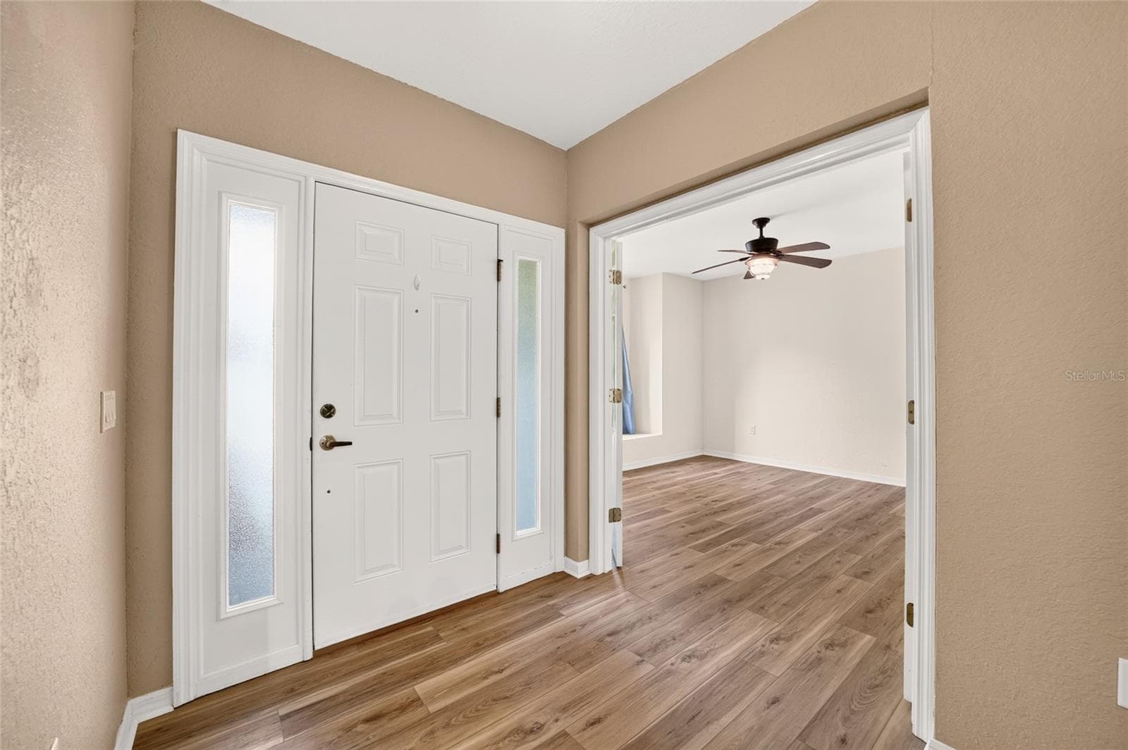 Front door and 2nd bedroom - 19369 SW 100TH LOOP, DUNNELLON
