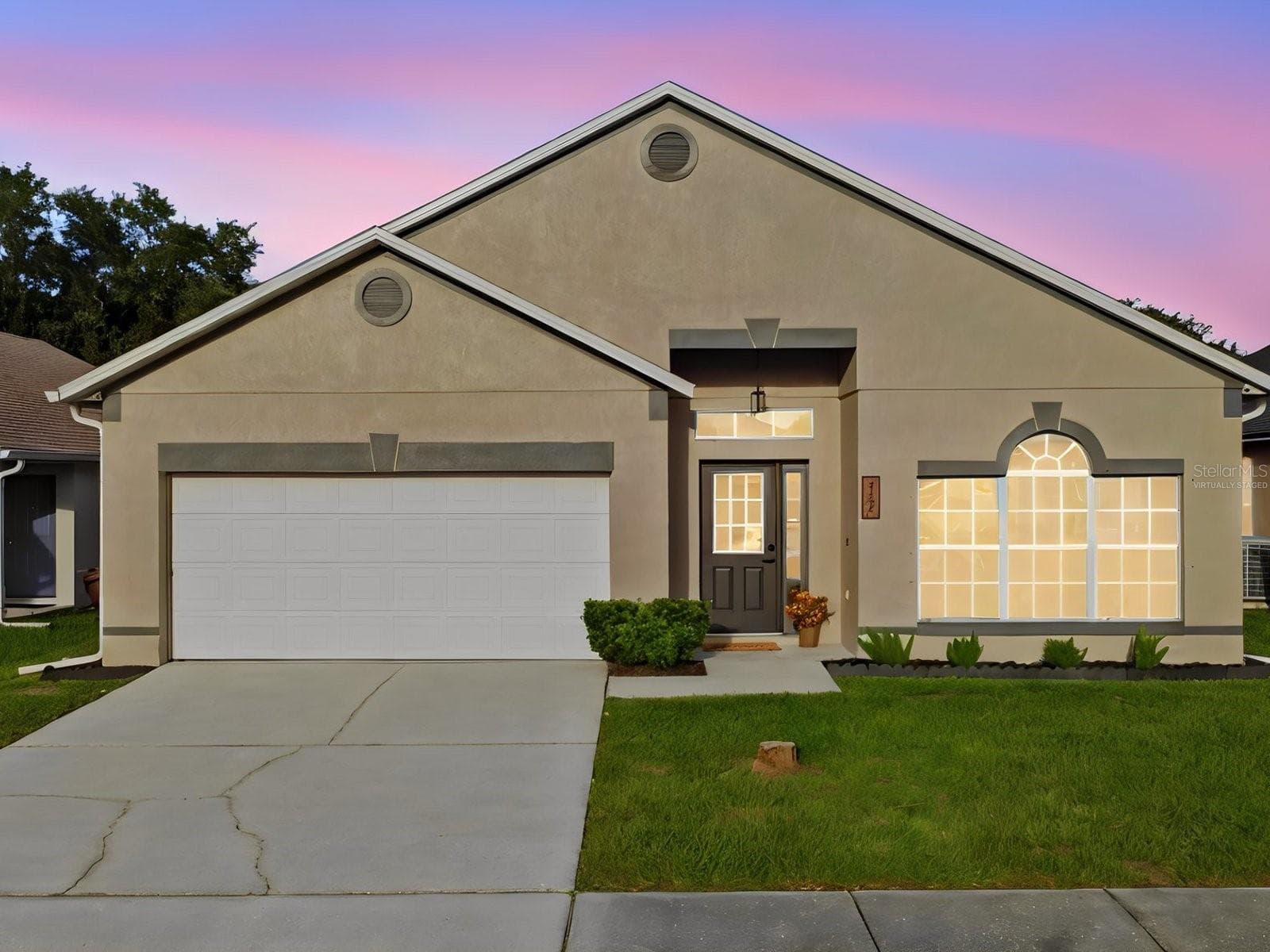Front of Home (Select photos have been virtually staged) - 2104 MALLARD CREEK CIR, KISSIMMEE