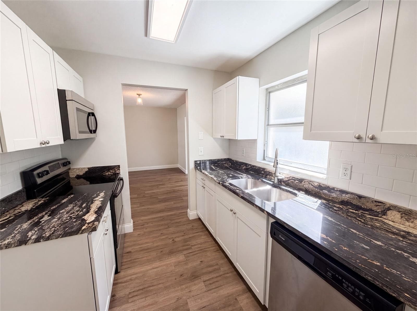 Single Family Residence at 5064 BROMLEY AVE, SPRING HILL, photo 7 of 19