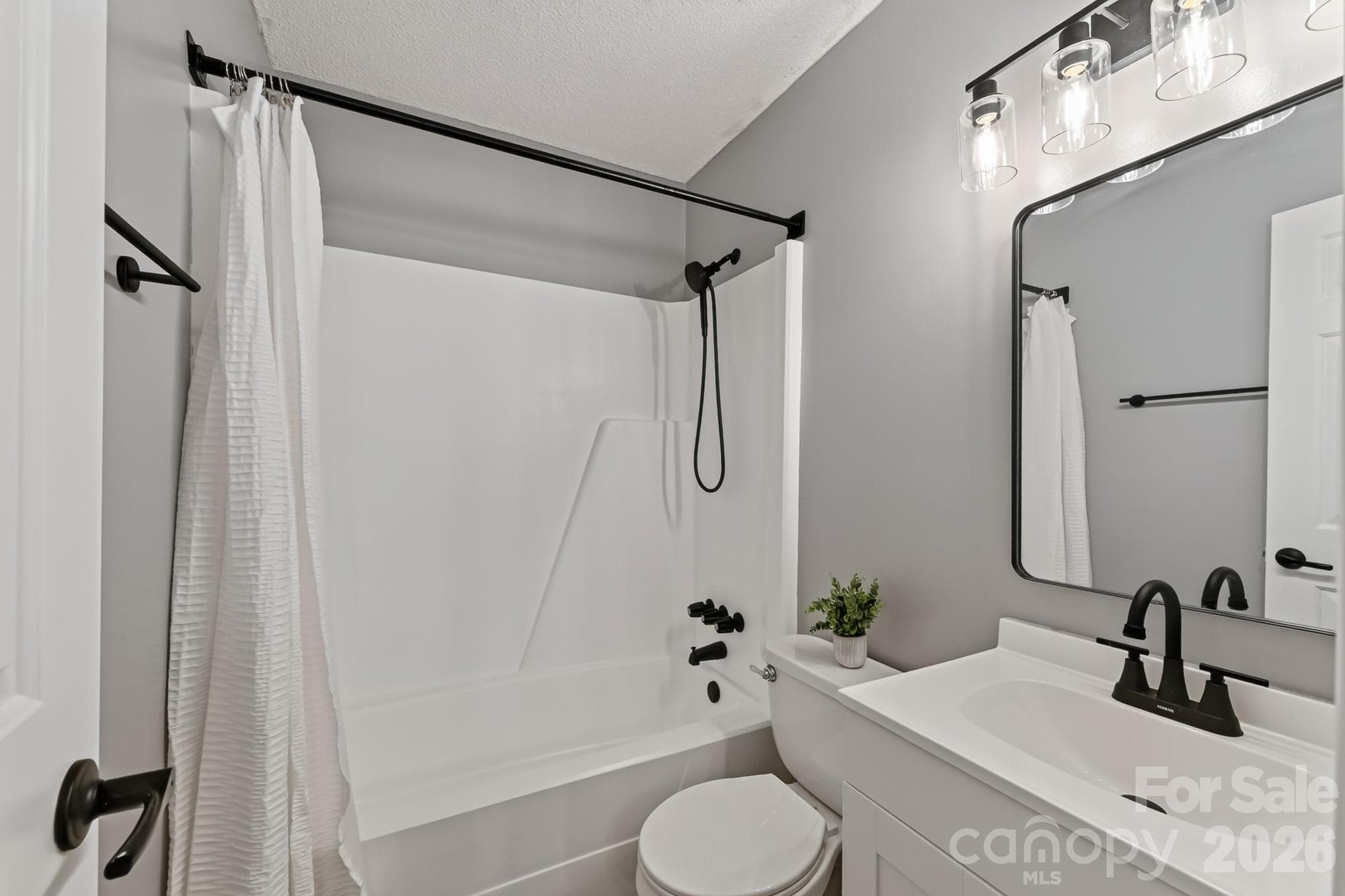 This part of the primary bath is in a private space, behind a door - 1620 Windyrush Lane, Gastonia