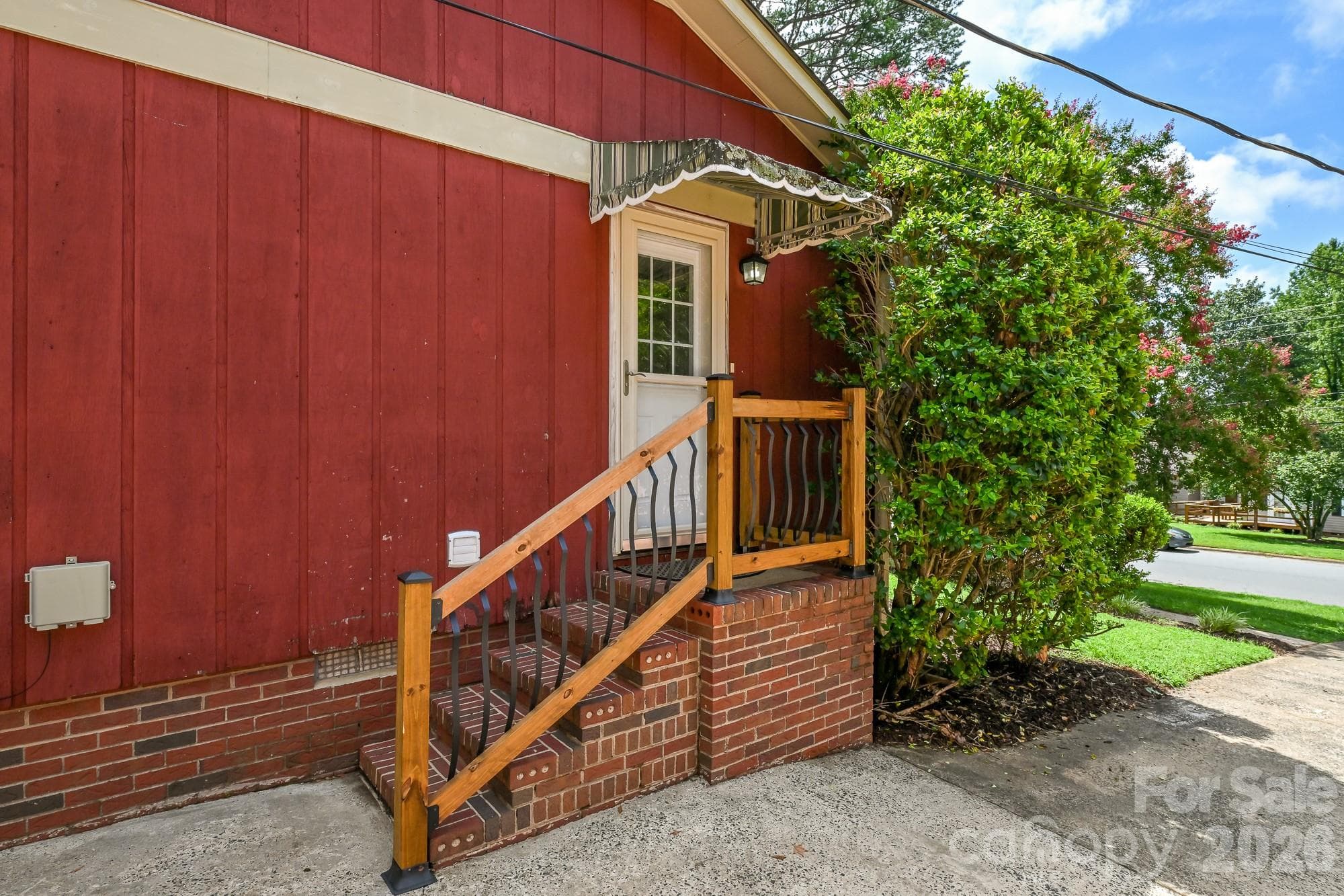 This door off the driveway enters into the kitchen's breakfast area - 1620 Windyrush Lane, Gastonia