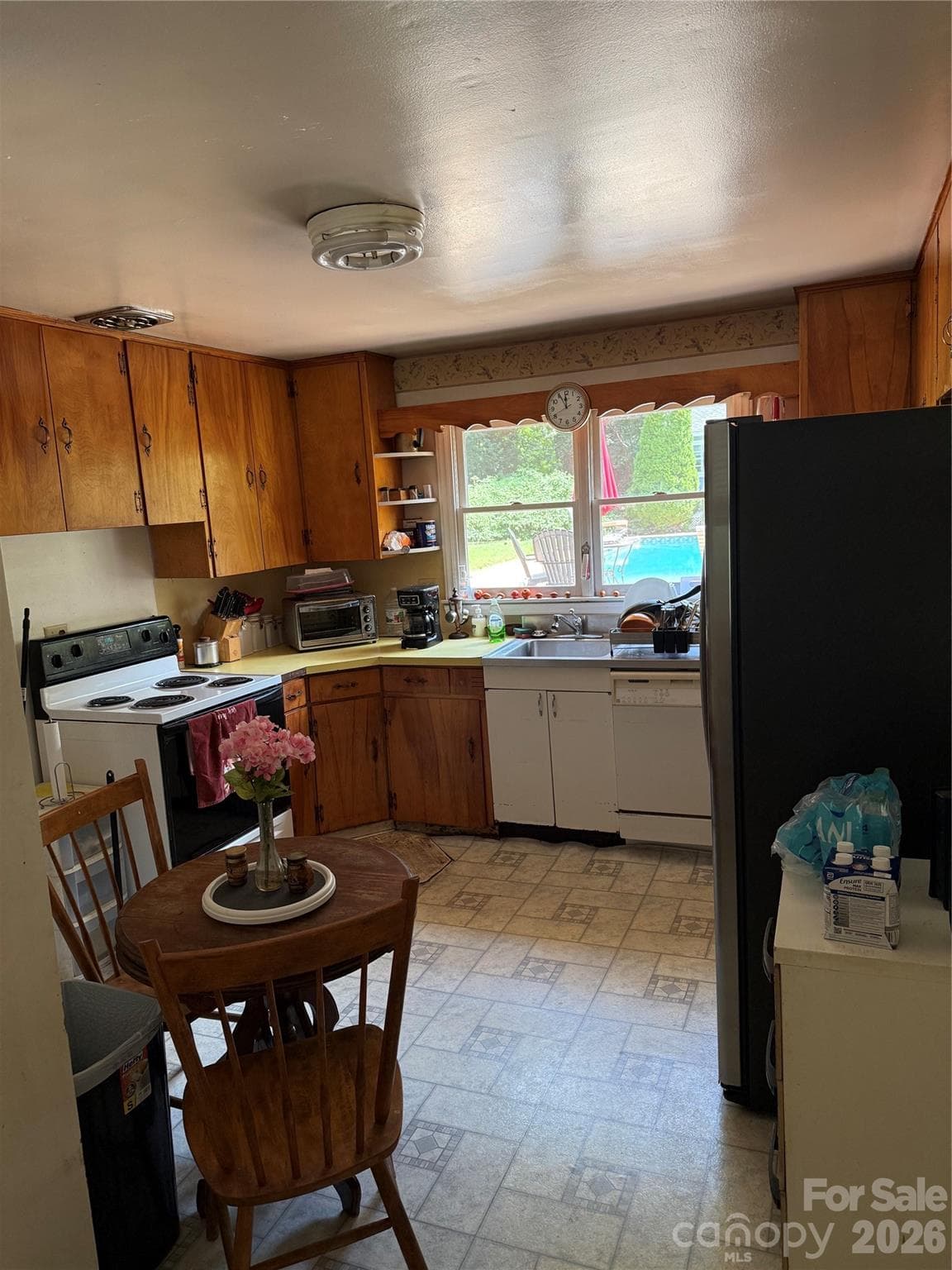 Kitchen with Pool View - 3218 Driftwood Drive, Charlotte
