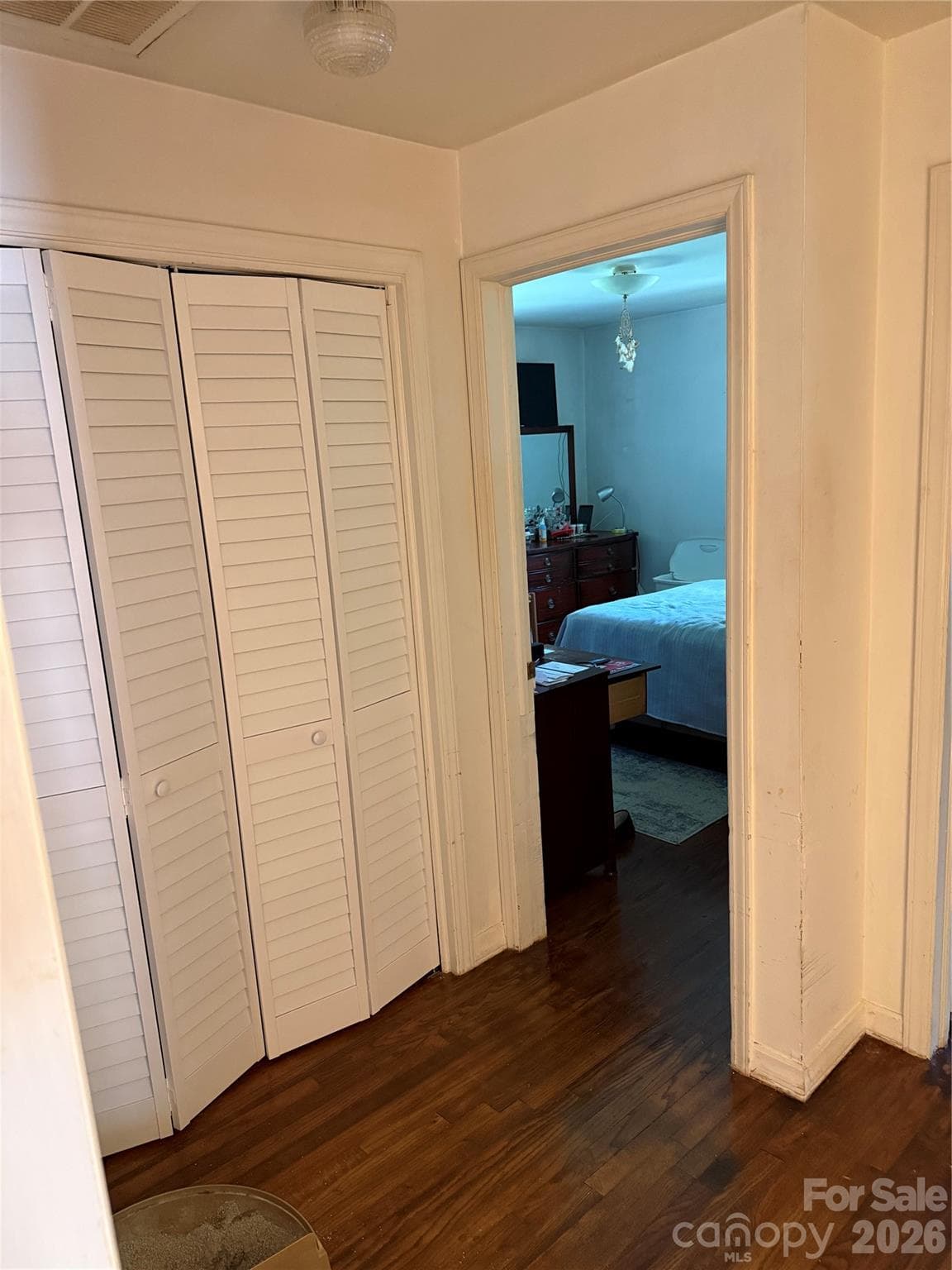 View of Primary Bedroom suite with hallway and Extra Closet - 3218 Driftwood Drive, Charlotte