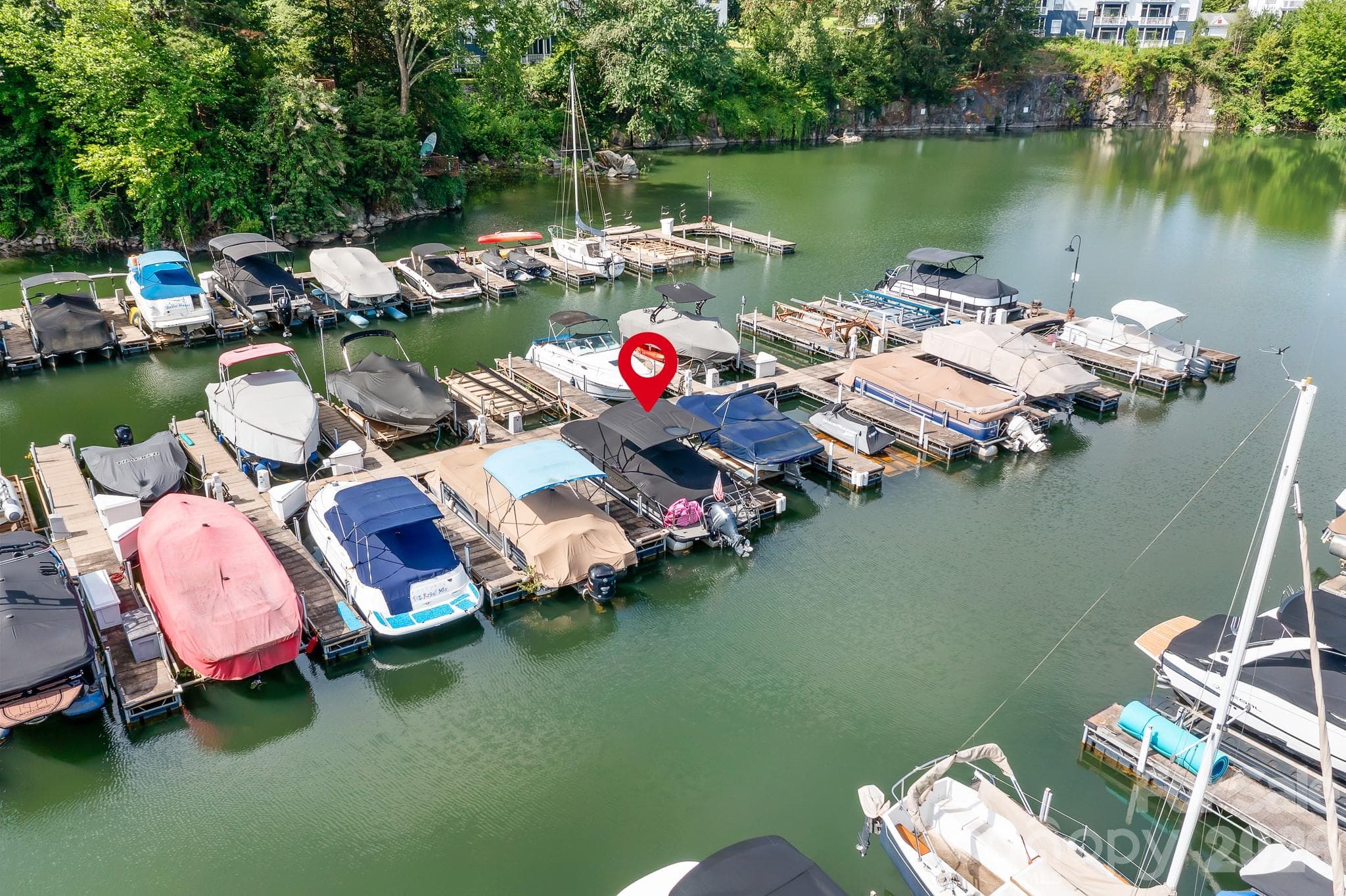 DEEDED BOAT SLIP #100.  Water, Electric and gated docks. Tucked in a quiet cove area. - Cornelius