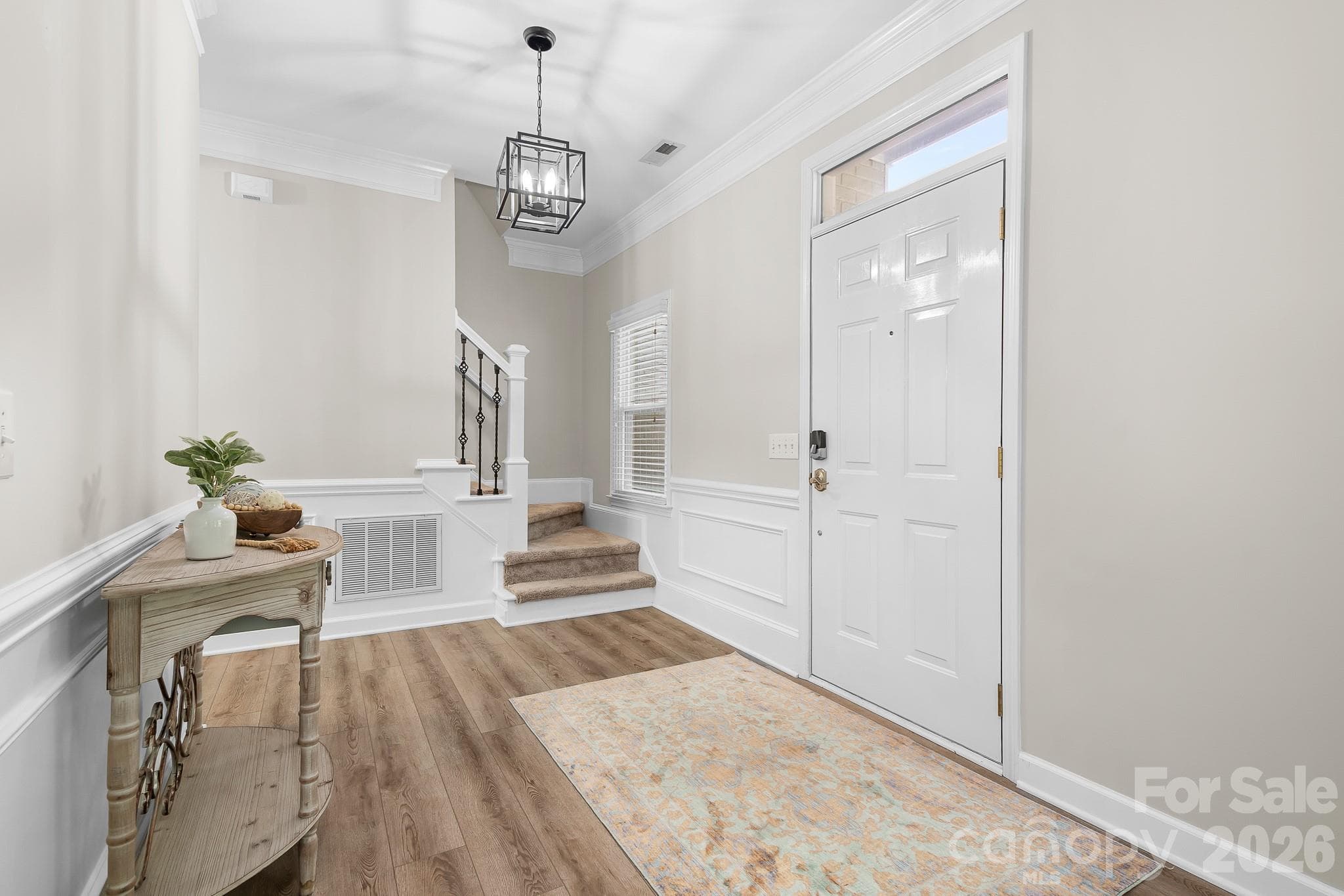 Welcoming Foyer area. Smooth Ceilings, Fresh Paint, Solid LVP flooring throughout main level. - Cornelius