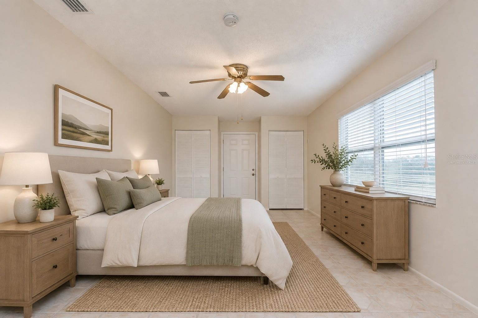 Guest bedroom #1 w barn doors and access to patio (virtually staged) - 8811 MARTINIQUE LN, PORT RICHEY
