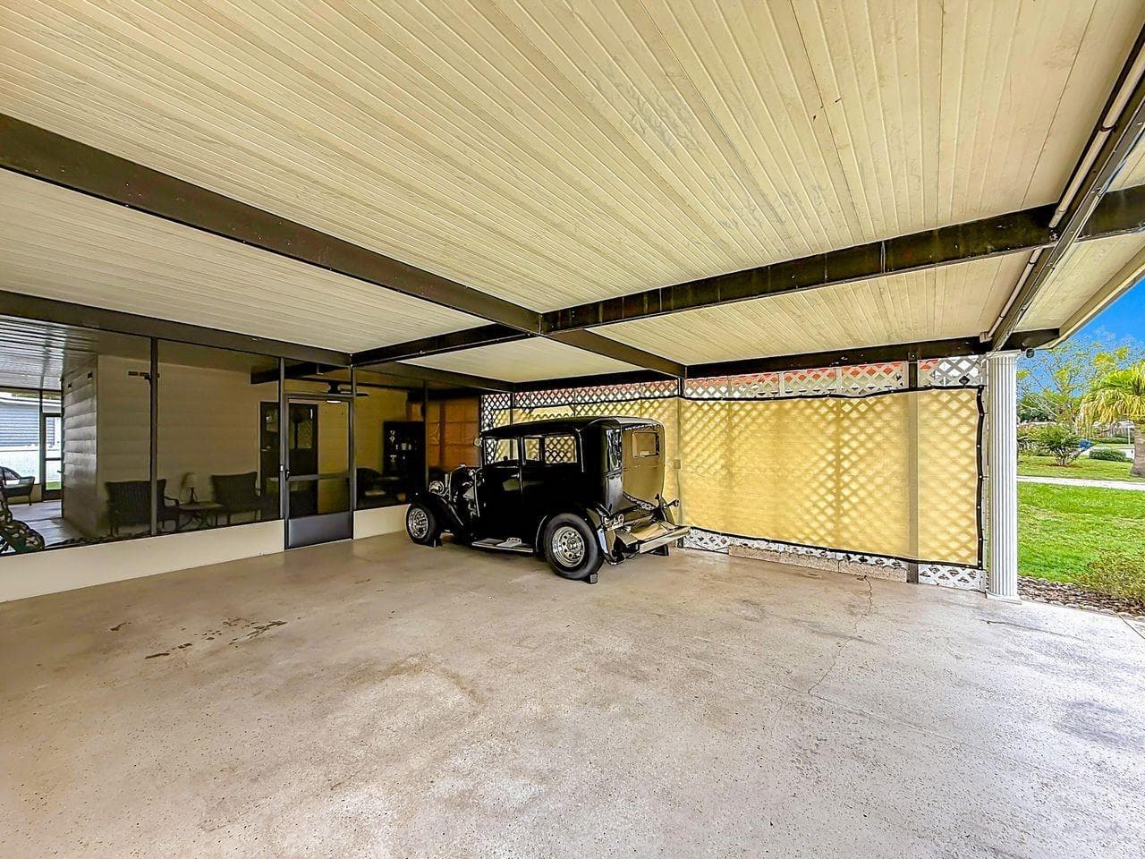 Parking for 2 cars under the carport - 1690 NASSAU CIR, TAVARES