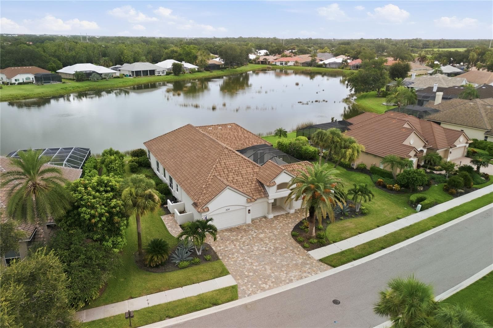 Aerial View of Home and Pond - 309 S STONE BRIAR CREEK DR, VENICE